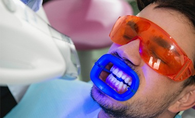 man undergoing teeth whitening