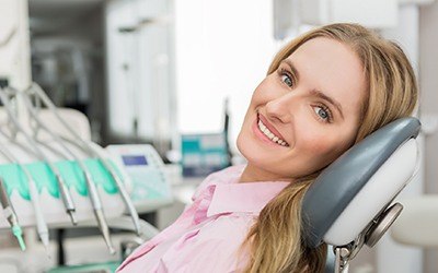 Smiling woman in dental chair